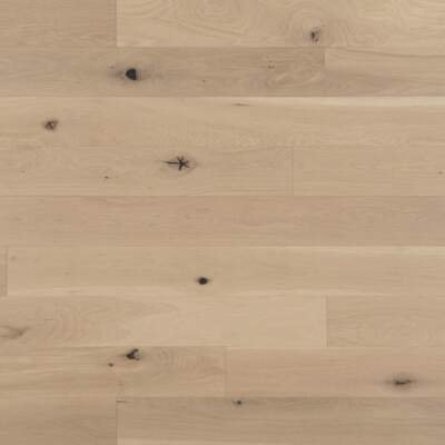 The White Oak White Mist Character Brushed flooring by Mirage Floors, part of the Flair Collection, epitomizes the natural grace and character of wood.