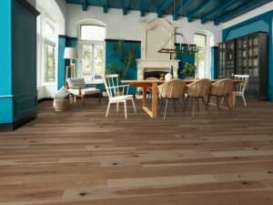 The Hickory Clay Marbles Character Brushed flooring from Mirage Floors' Sweet Memories Collection is a captivating representation of timeless elegance and lasting durability. Here's a detailed description highlighting its distinctive features