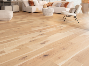 The Hickory Sandy Reef Character Brushed flooring by Mirage Floors, part of the Flair Collection, beautifully embodies the natural elegance and character of wood