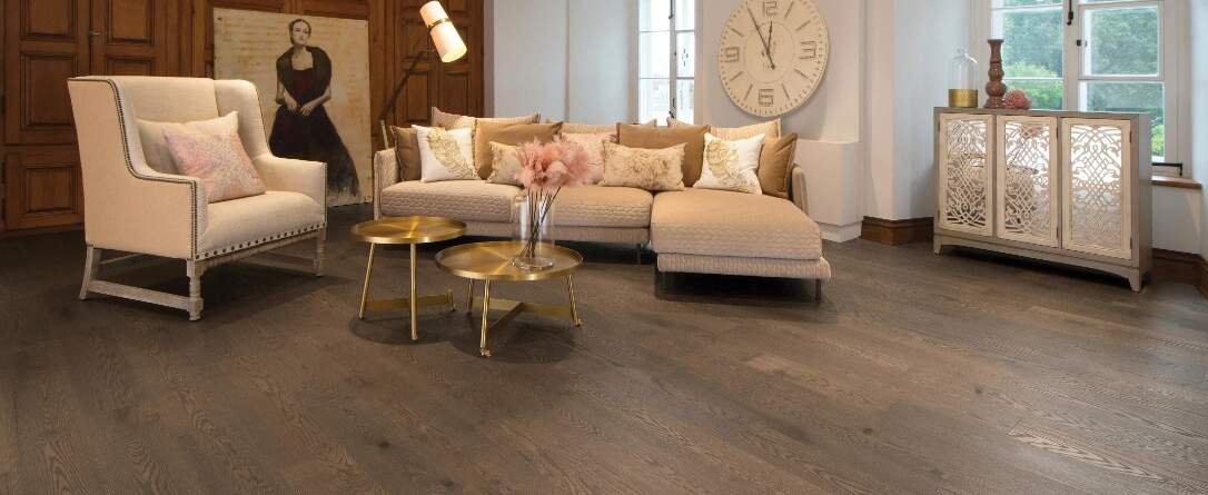 The White Oak Sailing Stone Character Brushed flooring from Mirage Floors' Flair Collection encapsulates the innate elegance and character of wood