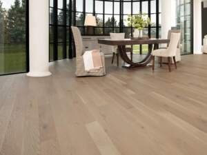 The White Oak Stardust Character Brushed flooring by Mirage Floors, part of the Flair Collection, epitomizes the natural grace and character of wood.