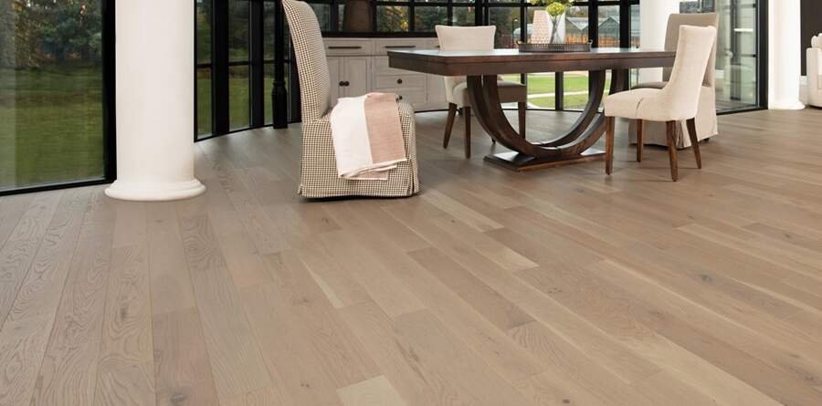 The White Oak Stardust Character Brushed flooring by Mirage Floors, part of the Flair Collection, epitomizes the natural grace and character of wood.