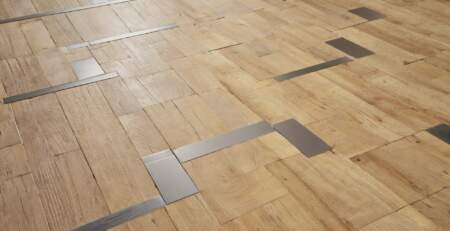 light color mix of hardwood and metal inlays flooring trend 2025