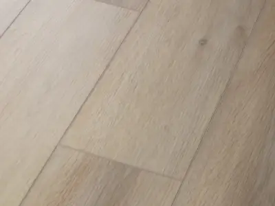 Aldergrove Oak COREtec Pro Enhanced close-up — low-contrast wood grain on 5mm waterproof SPC with 20 mil wear layer