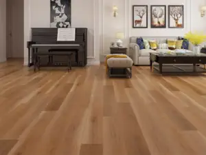 American Cherry SPC flooring in a classic living room, golden amber lit by a warm honeyed glow.