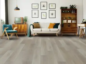 Cambridge Elm COREtec Pro Premium SPC installed in living room — Warm greige with subtle taupe undertones — Fremont
