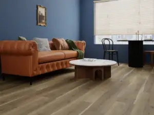 Cardinal Paradigm Flooring Performer PLUS SPC installed in living room — rich amber-brown with muted earthy — Los Gatos