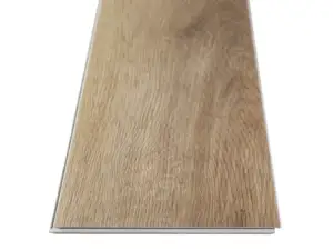 FloorScore-certified Cartwheel Oak COREtec Pro Classics SPC in smooth finish — light tan-brown with white baseboards and trim