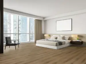 Charm Paradigm Flooring Conquest 20MIL SPC installed in bedroom — rustic tan-to-amber blend — Newark