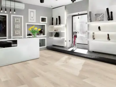 Dublin Pine COREtec Pro Enhanced SPC installed in modern interior — soft linen beige — San Carlos
