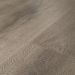 Elliptical Oak COREtec Pro Classics close-up — scattered small dark knots on 5mm waterproof SPC with 20 mil wear layer