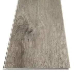 FloorScore-certified Elliptical Oak COREtec Pro Classics SPC in smooth finish — warm grey-beige with white shaker cabinets