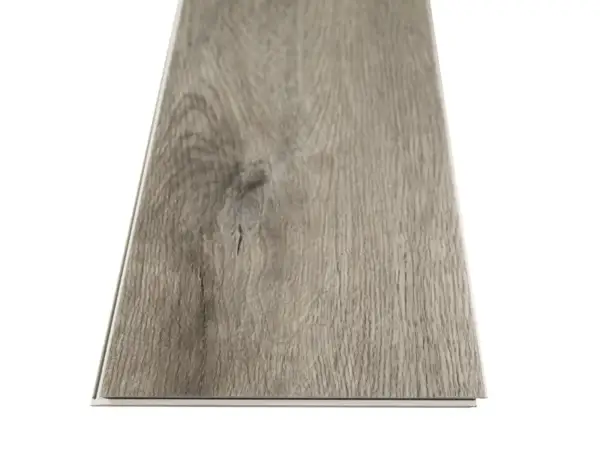 FloorScore-certified Elliptical Oak COREtec Pro Classics SPC in smooth finish — warm grey-beige with white shaker cabinets