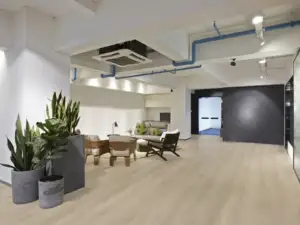 Enchantment Paradigm Flooring Conquest 20MIL SPC installed in open studio loft — light beige with warm, lived-in — Milpitas
