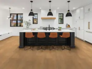Fairhaven Oak COREtec Pro Premium SPC installed in kitchen — Soft warm brown with understated golden warmth — Union City