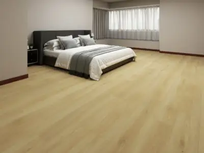 Ios Paradigm Flooring Odyssey 20MIL WPC installed in spacious modern bedroom — golden honey blend with warm amber — Cupertino