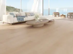 Joy eSPC flooring in a coastal living room, soft cream-tinted pale blonde.