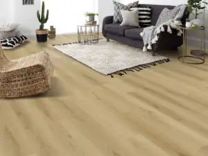 Brandberg BP701 Lago Ultra Clean™ 6.5mm SPC 9-inch planks, warm golden oak in a living room.
