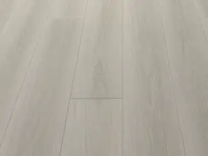 Lake Garda LG809 Lago Scratch Shield-LG8 SPC 9-inch wide waterproof flooring, warm grey in styled interior.