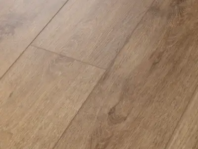 Lyric Oak COREtec Pro Enhanced close-up — scattered small dark knots on 5mm waterproof SPC with 20 mil wear layer