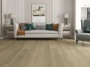 Partridge Paradigm Flooring Performer PLUS SPC installed in formal sitting room — warm honey-amber — San Carlos