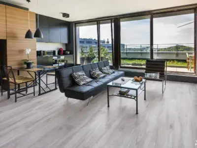 Peridot Vellichor Gemstone SPC installed in open-plan great room — pale grey wood featuring soft beige undertones — Los Gatos