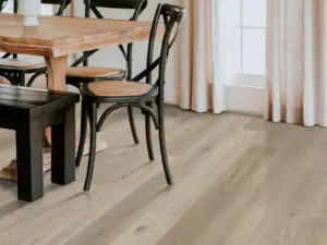 Radley Oak COREtec Pro Enhanced SPC installed in dining room — sandy brown with warmth — Saratoga