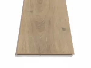 Ravenswood Oak COREtec Pro Premium close-up — scattered small dark knots on 5.2mm waterproof SPC with 20 mil wear layer