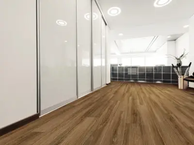 Rocca Oak COREtec Pro Enhanced SPC installed in office — rich medium brown, consistently warm across planks — Redwood City