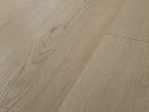 Sharpwell Oak COREtec Pro Enhanced close-up — subtle knots on 5mm waterproof SPC with 20 mil wear layer