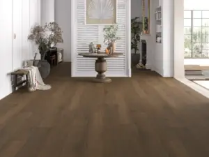 Tofino Paradigm Flooring Insignia 20MIL WPC installed in hallway — medium-dark brown with warm honey undertones — Campbell