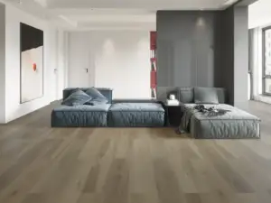 Toucan Paradigm Flooring Performer PLUS SPC installed in high-rise condo bedroom lounge — earthy medium brown — Saratoga