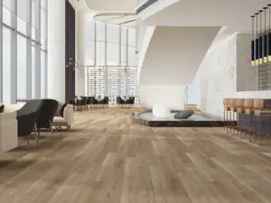 Windsor Paradigm Flooring Conquest 20MIL SPC installed in hotel lobby with lounge and bar — warm honey-tan — Mountain View
